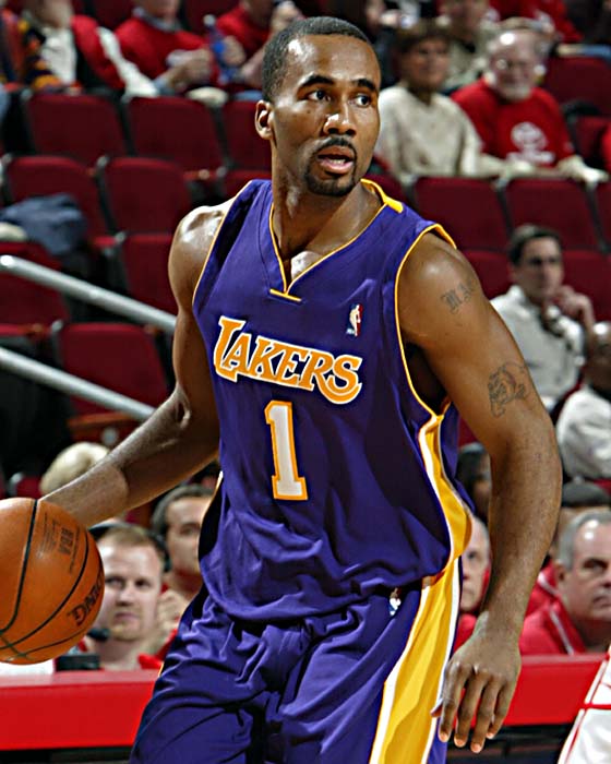 Lakers v Rockets HOUSTON - FEBRUARY 11: Maurice Carter #1 of the Los Angeles Lakers drives against the Houston Rockets during the game at Toyota Center on February 11, 2004 in Houston, Texas. The Rockets won 102-87. NOTE TO USER: User expressly acknowledges and agrees that, by downloading and/or using this Photograph, user is consenting to the terms and conditions of the Getty Images License Agreement. (Photo by Bill Baptist/NBAE via Getty Images)
